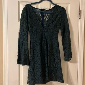 Deep green lace mini dress, flounce skirt and v neck with tags